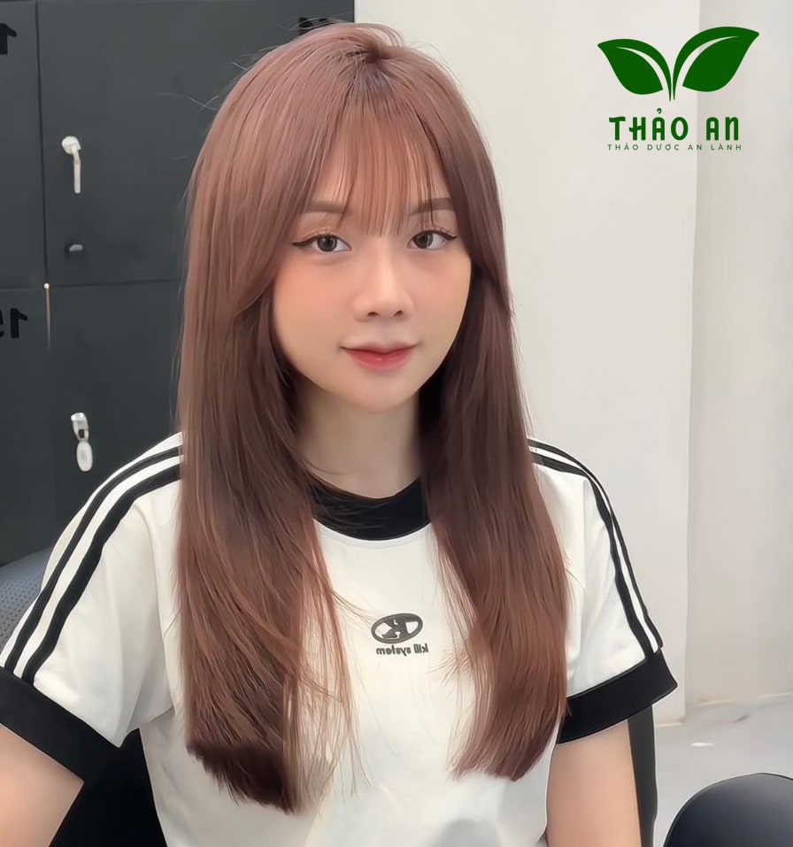 Kiểu tóc mái dài cho mặt tròn